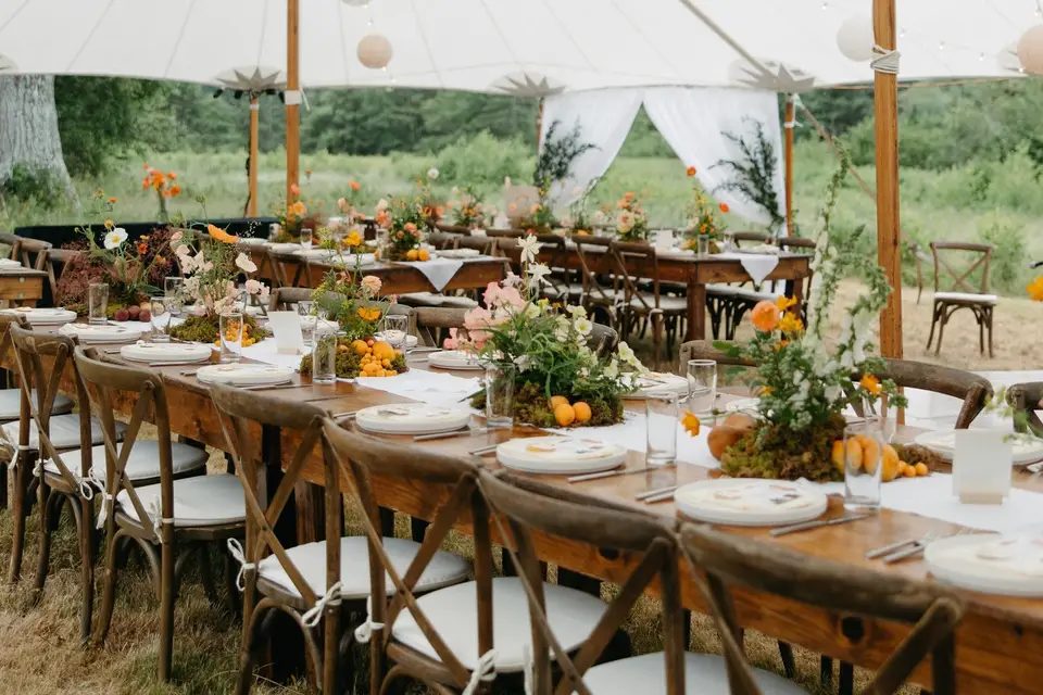 A second view of the tented reception, set for dinner